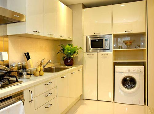Máy giặt được bố trí trong tủ bếp